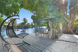 Lush Waterfront Oasis w/ Heated Pool/ Hot Tub/Dock